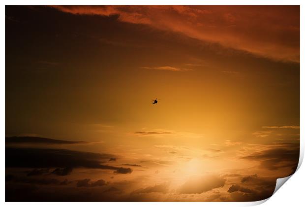 Helicopter at sunset Print by Ian Jeffrey