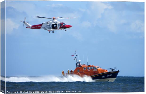 Sea rescue featuring coastguard helicopter and RNL Canvas Print by Mark Campion