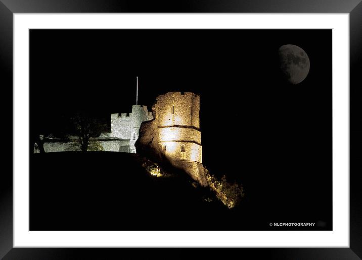 Castle at night Framed Mounted Print by Nigel Coomber
