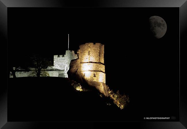 Castle at night Framed Print by Nigel Coomber