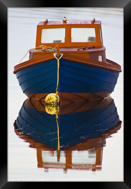 Boat reflection Framed Print by Gabor Pozsgai