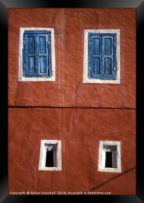 Moroccan wall and windows Framed Print by Adrian Snowball