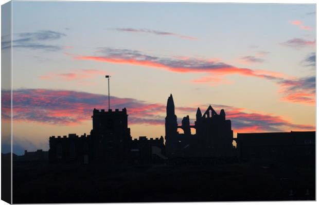 Whitby Abbey and St Mary's Church at sunrise Canvas Print by Chris Harris