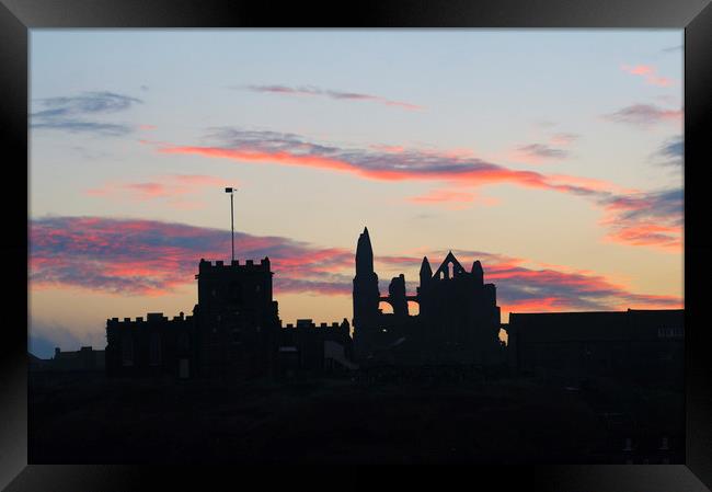 Whitby Abbey and St Mary's Church at sunrise Framed Print by Chris Harris