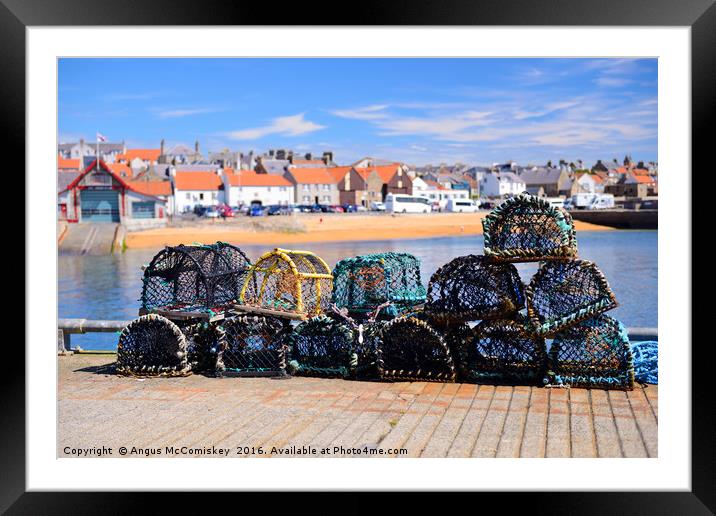 Lobster pots on quayside at Anstruther Framed Mounted Print by Angus McComiskey