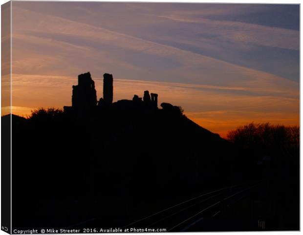 Sunset over Corfe Castle Canvas Print by Mike Streeter