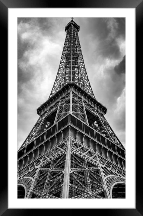 Low angle view of the Eifel Tower on a cloudy day Framed Mounted Print by George Cairns