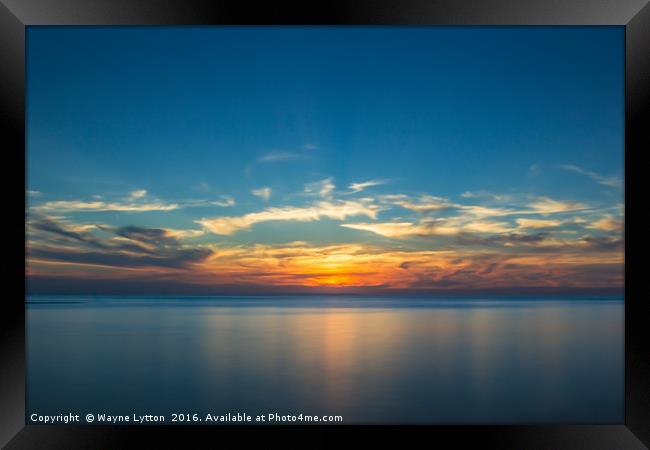Sunset over the isle of sheppy Framed Print by Wayne Lytton