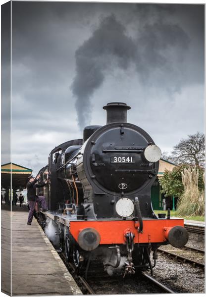 HORSTED KEYNES, UK - MARCH 19, 2016: Driver climbs Canvas Print by George Cairns