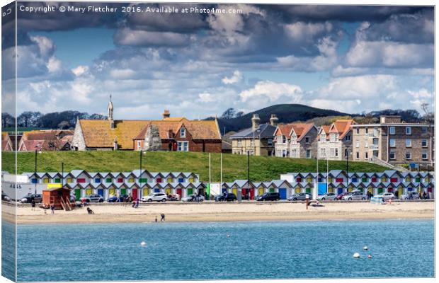 Swanage Beach Huts Canvas Print by Mary Fletcher