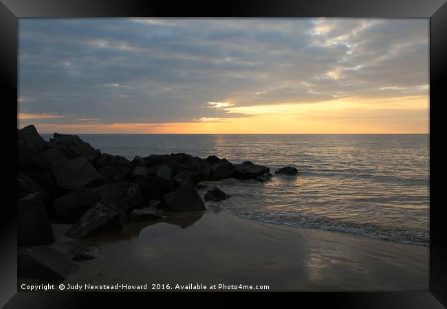 Sunset at Brancaster beach, Norfolk Framed Print by Judy Newstead-Howard