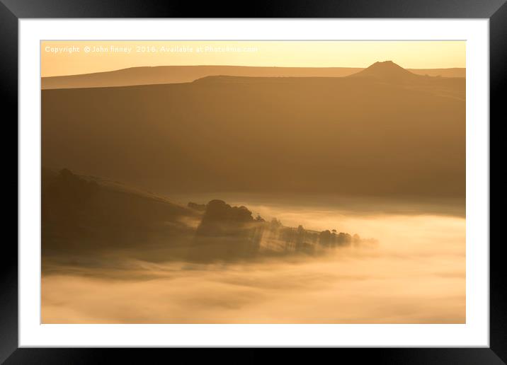 Winhill over a golden misty Hope valley at sunrise Framed Mounted Print by John Finney