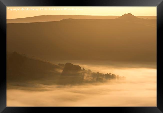 Winhill over a golden misty Hope valley at sunrise Framed Print by John Finney