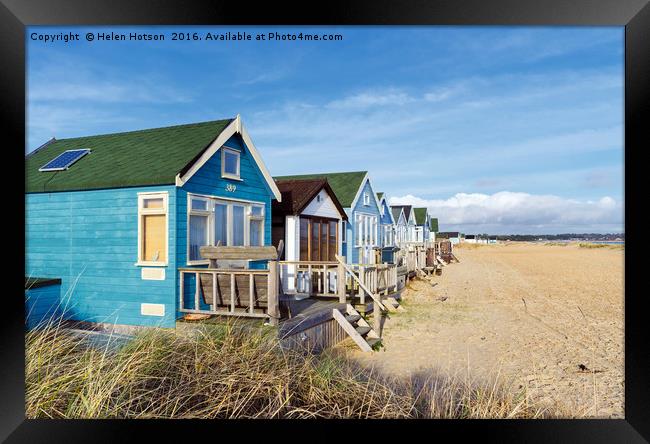 Vibrant Luxury Beach Huts at Mudeford Spit Framed Print by Helen Hotson