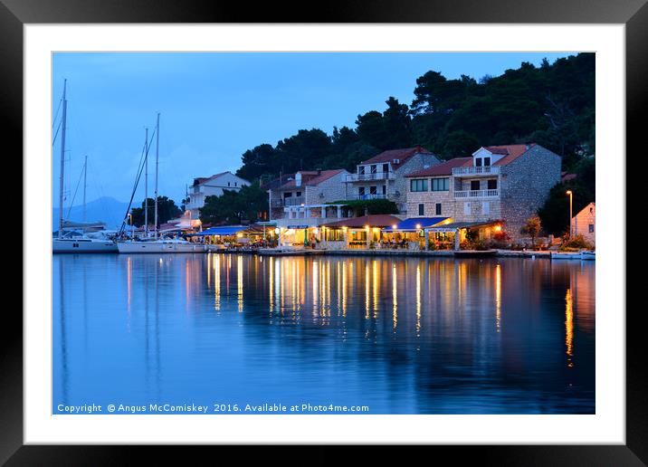 Pomena harbour at dusk Framed Mounted Print by Angus McComiskey