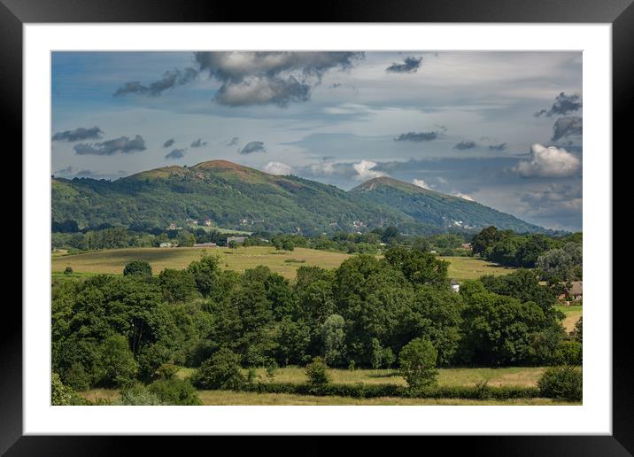 The Malvern Hills from Birtsmorton Common Framed Mounted Print by Sue Dudley