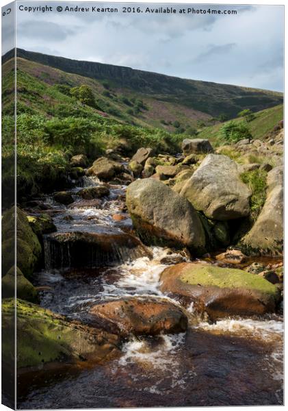 Rocky moorland stream at Crowden, Derbyshire Canvas Print by Andrew Kearton