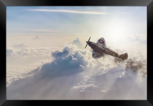 Spitfire over the sun Framed Print by Steve Hardiman
