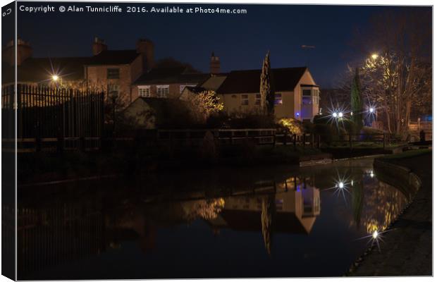 Reflections in a canal Canvas Print by Alan Tunnicliffe