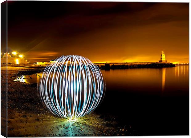 Light Orb by The Sea Canvas Print by Paul Welsh