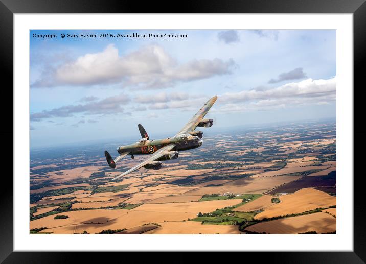 Lancaster PA474 over England Framed Mounted Print by Gary Eason