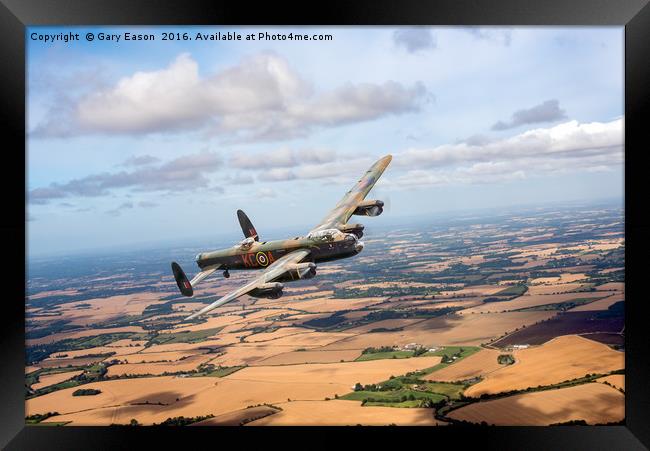 Lancaster PA474 over England Framed Print by Gary Eason