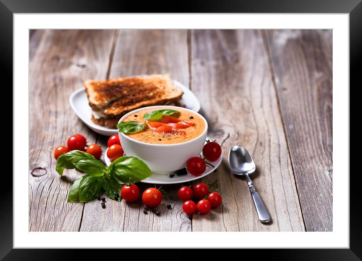 Fresh bowl of creamy tomato soup and sandwich with Framed Mounted Print by Thomas Baker