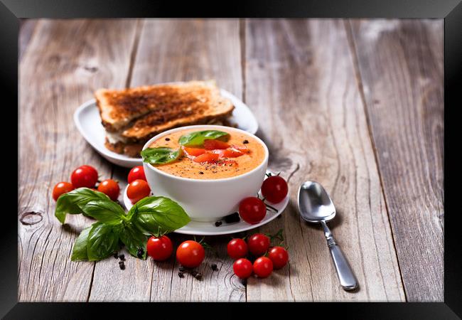 Fresh bowl of creamy tomato soup and sandwich with Framed Print by Thomas Baker
