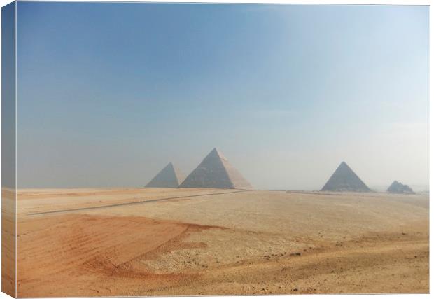 Pyramids on the Giza Plateau  Canvas Print by Jackie Davies