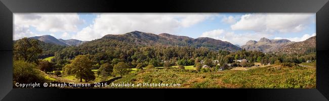 Elterwater village and Langdale in the Lake Distri Framed Print by Joseph Clemson