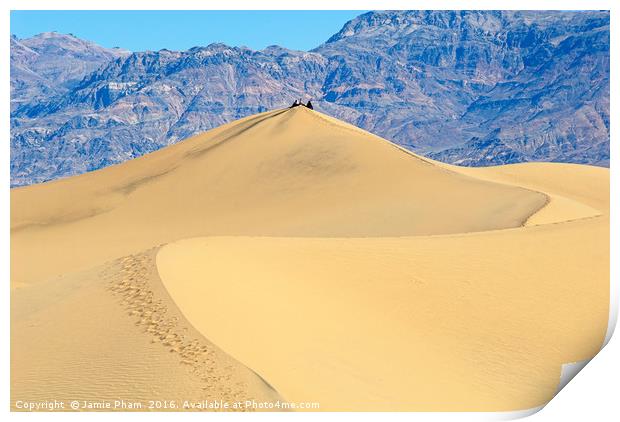 People sitting on top of a large sand dune in Deat Print by Jamie Pham
