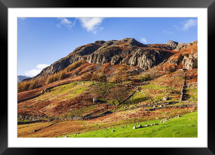 A sunny Autumnal view of the  Langdale Pikes Framed Mounted Print by Ian Duffield