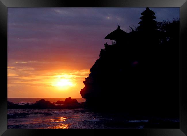 Sunet at Tanah Lot Framed Print by Nic Christie