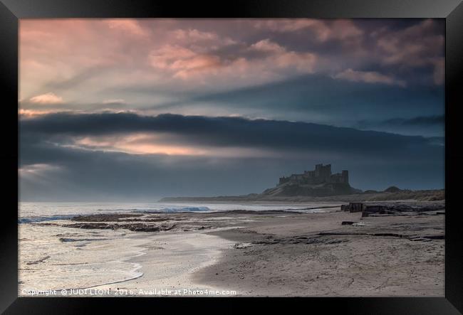 Bamburgh Castle sunrise Framed Print by JUDI LION
