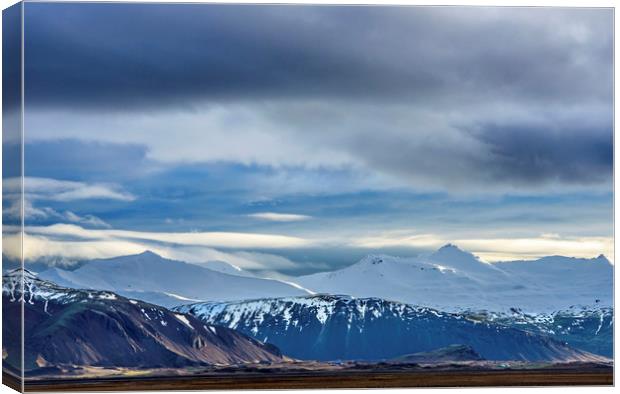 Snow covered mountains south Iceland Canvas Print by Nick Jenkins