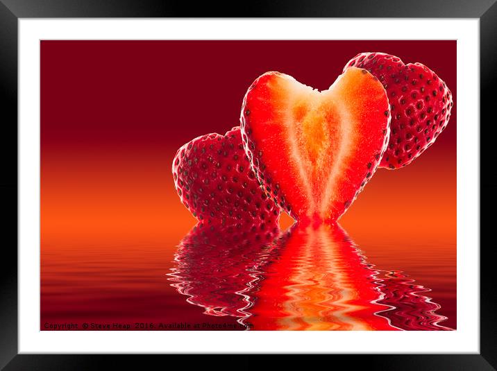 Fresh sliced strawberry in heart shape reflected Framed Mounted Print by Steve Heap