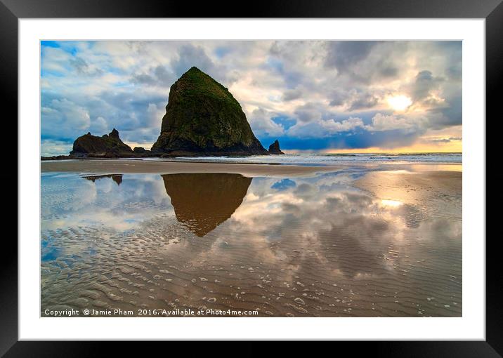 Cannon Beach with storm clouds in Oregon Framed Mounted Print by Jamie Pham