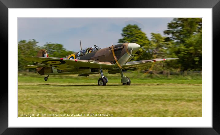 Lowdown Spitfire take-off Framed Mounted Print by Tom Dolezal
