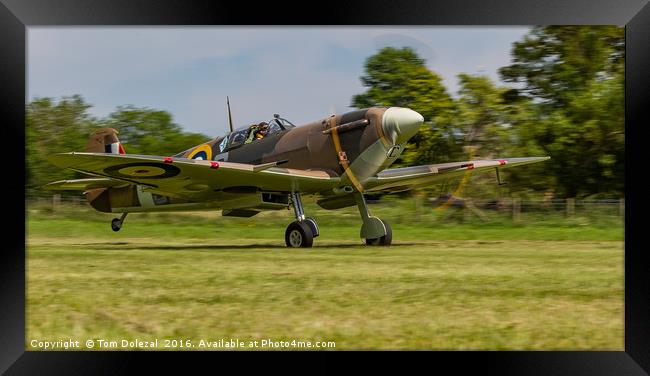 Lowdown Spitfire take-off Framed Print by Tom Dolezal