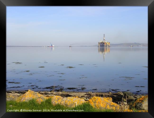Udale Bay, RSPB reserve and oil rigs Framed Print by Rhonda Surman