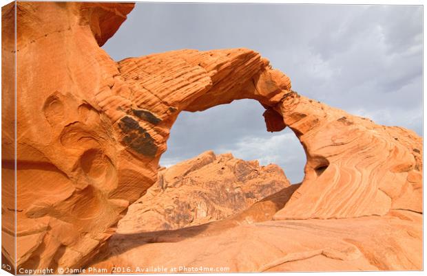 Arch Rock in the Valley of Fire State Park, Nevada Canvas Print by Jamie Pham