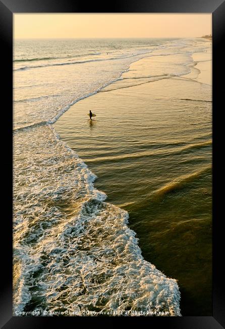 Lone surfer waiting for the perfect wave in Huntin Framed Print by Jamie Pham