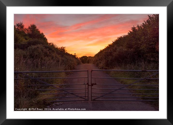 Sky on fire Framed Mounted Print by Phil Reay