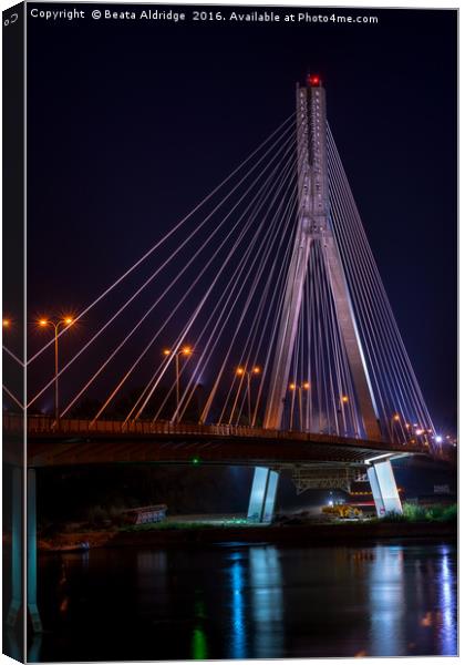 Swietokrzysk bridge in Warsaw at night Canvas Print by Beata Aldridge