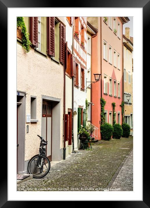 Back streets and a bike Framed Mounted Print by Lynne Morris (Lswpp)