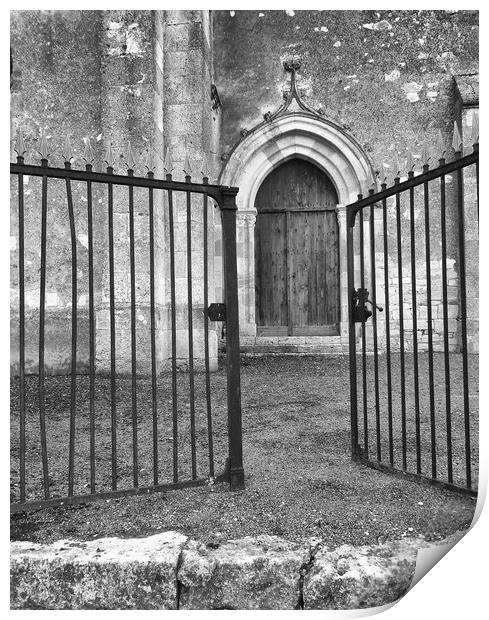 Church door through the gates Print by Peter Balfour