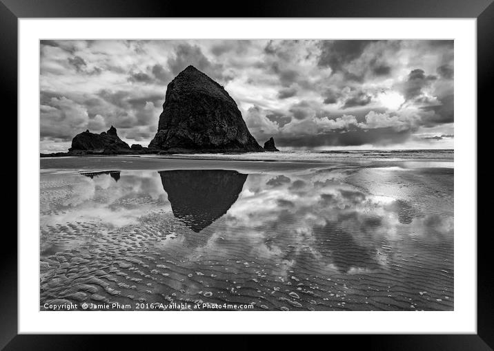 Cannon Beach with storm clouds in Oregon Framed Mounted Print by Jamie Pham