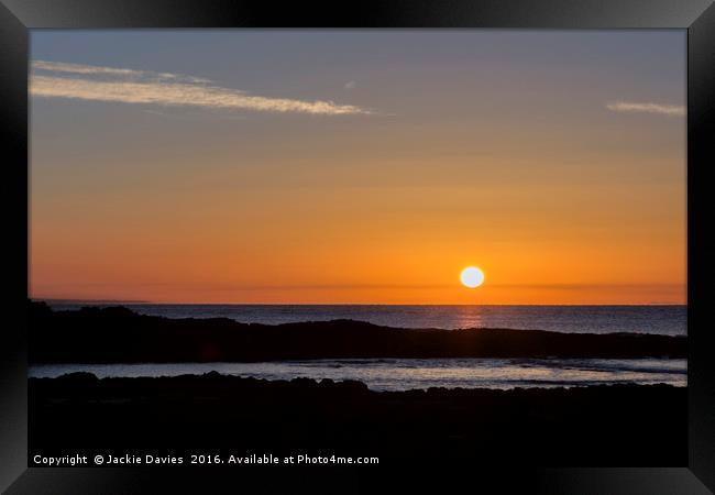 Sunrise over the Ocean Framed Print by Jackie Davies
