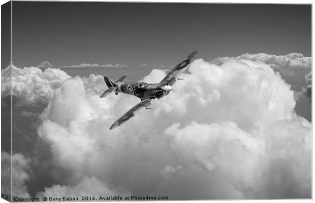 Spitfire above clouds B&W version Canvas Print by Gary Eason