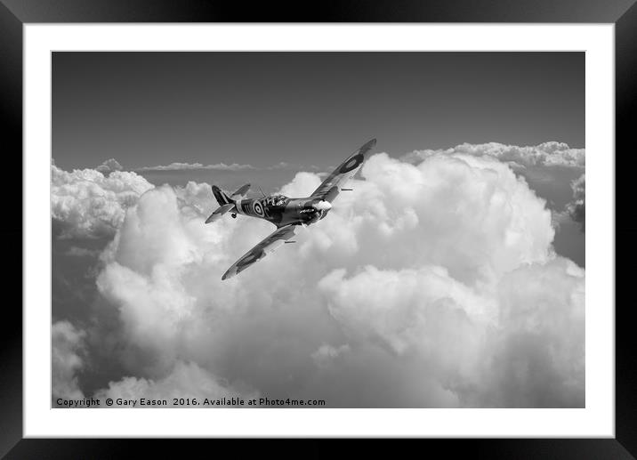 Spitfire above clouds B&W version Framed Mounted Print by Gary Eason